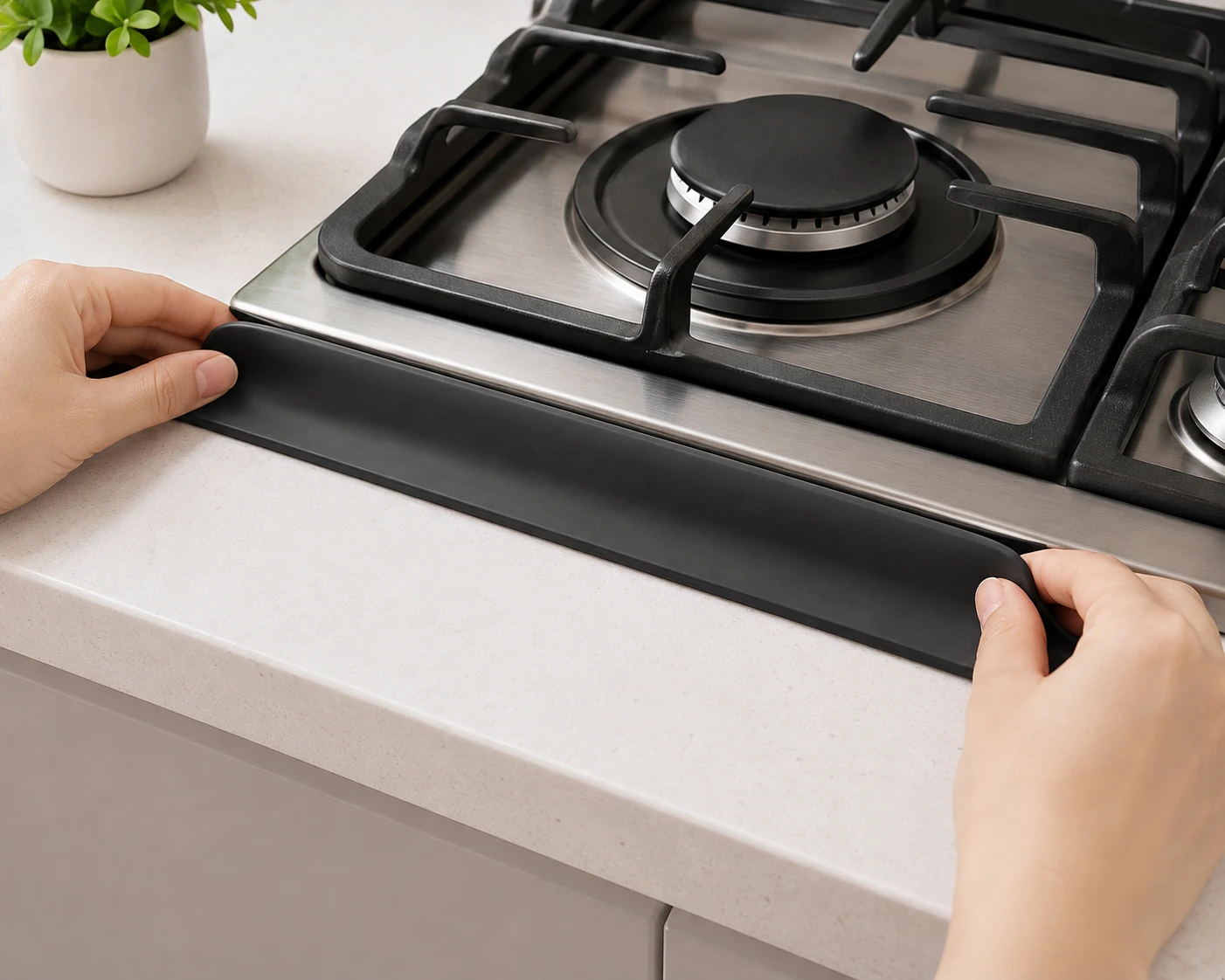 Expandable silicone stove gap guard beside a cooker